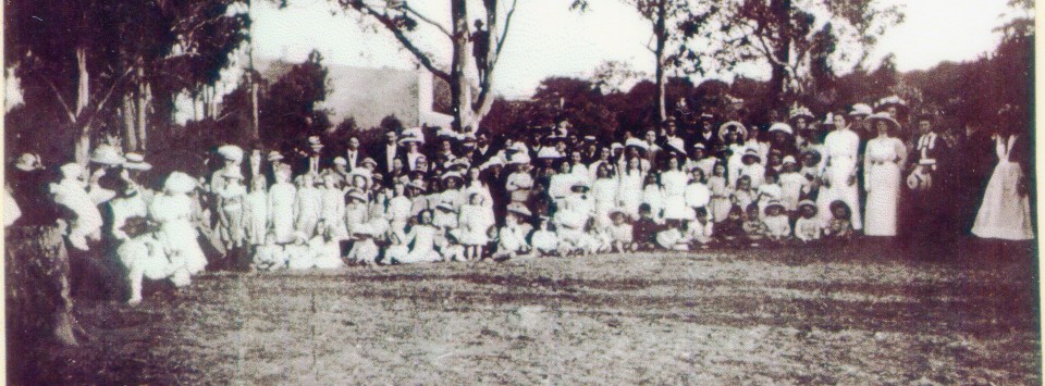 School photo of students, parents and teachers with the label "gathering at N Ryde School -Cox's Rd Looking East.
